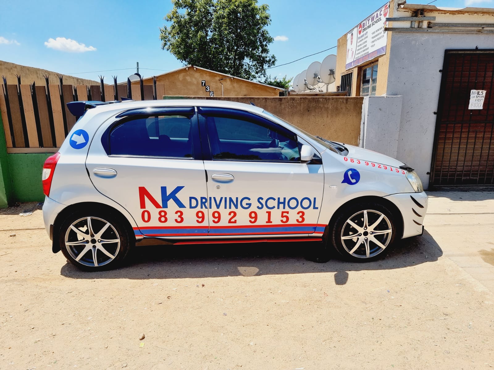 NK Driving School car - side view